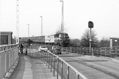 DSB MZ class photographed at the Lillebæltsbroen - heading for Middelfart. 9. April 1978.  The MZ class (type I and II) was purchased from 1967 to 1970 in a number of 26. Only a few of these engines remain in service by DSB - most are now sold to other companies. Built by NOHAB and Frichs. Dieselelectric. Co'Co'. 2270 kW - 3300 hp. Max speed 143 km/h - 89 mph. Length 20 800 mm. Weight 116,5 metric tonnes.